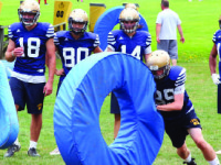 The Wild Boars hone skills and push limits at practice in preparation for the 2016 season.