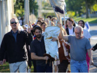 The Torah procession began at the Sally Hart Lodge and ended at the Seymour St. John Chapel.