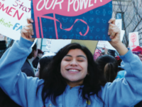 Sandra Leon '19 jubilantly protests at the Women's March in Hartford, Conn., following inauguration day.