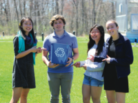 Melody Li ’18, Matt Aguiar ’18, Kelly Moh ’18, and Sophie Mackin ’18 gather to discuss Earth Week.