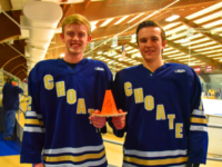 Boys’ JV Hockey Co-Captains John Burt ’18 and Ian Merrick ’18 with the Grim Cup.