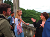 Owen Collins ’19, Jana Godbole ’19, and Emma Mears ’18 interact with an instructor in Galicia, Spain.