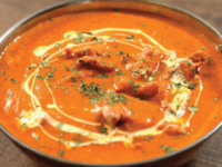 Zaika Indian Cuisine’s expansive menu includes marinated chicken in tomato sauce and lamb boti kebab masala.