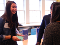 Itai Mupanduki ’19 and Tippa Chan ’19 welcome a prospective student during Spring Revist Days.