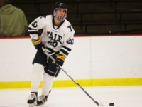 Chance Gorman ’18 carries the puck up the ice at the U.S.A. Hockey National Championships.