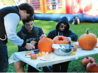Members of the Choate community get in the Halloween spirit by carving pumpkins. Photo by Ryan Kim/The Choate News