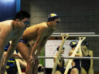 Ben Cho ’22 waits to dive in for a relay. Photo courtesy of Laura Solano-Florez
